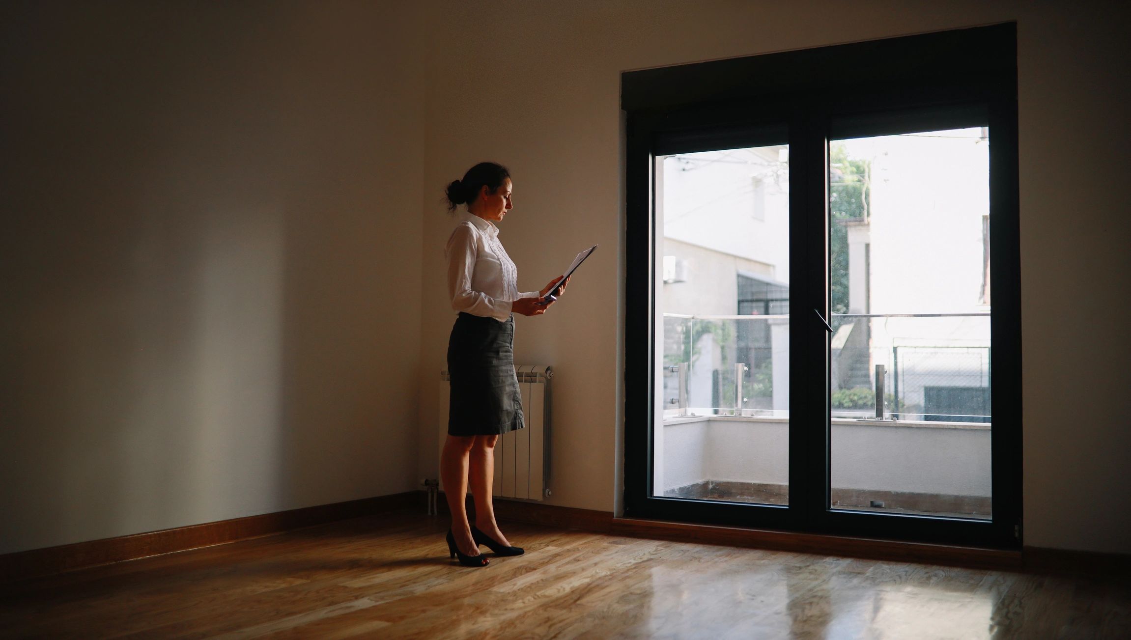 Property manager reviewing details in a residential unit