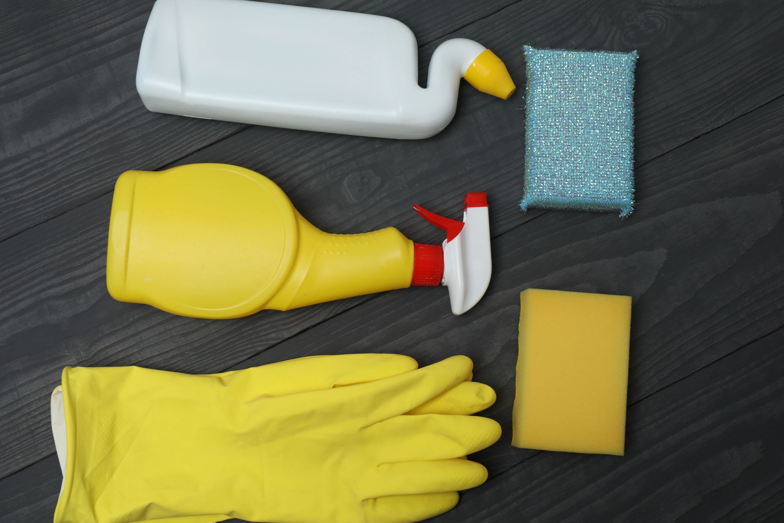 Cleaning supplies on a table representing commercial cleaning